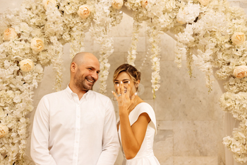 Happy young smiling couple in the marriage registration hall