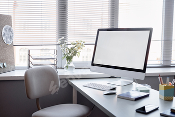 Blank Monitor at Office Workplace with Sunlight