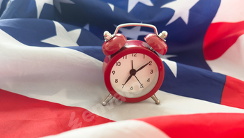 American Flag Concept With Alarm Clock