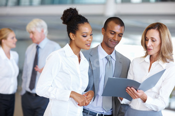 Business people looking at documents