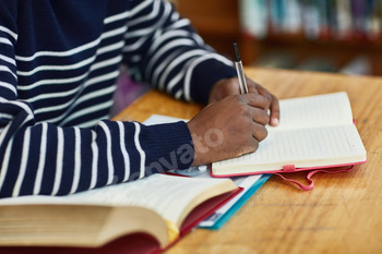 Preparing notes for his next class