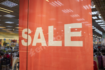 Red Sale Banner in Clothing Shop