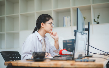 Female programmer working on coding,