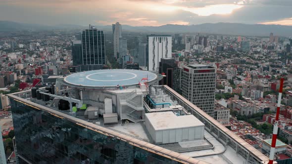 Cinematic Aerial Around the Helicopter Landing Site on the Rooftop, Mexico City