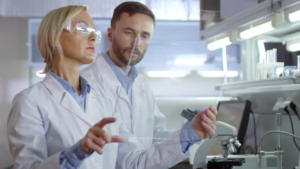 Scientists Using Transparent AR Screen for Experiment alt