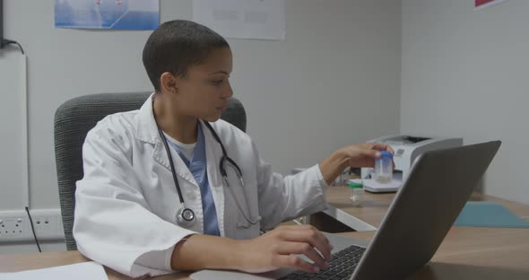 Medical professionals working at a hospital alt