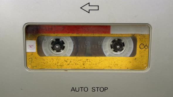 Tape Recorder Plays Audio Cassette Inserted Therein. Vintage Audio Tape