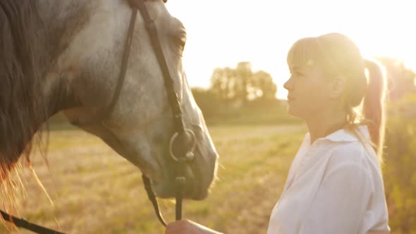 Woman Loves Her Gray Horse