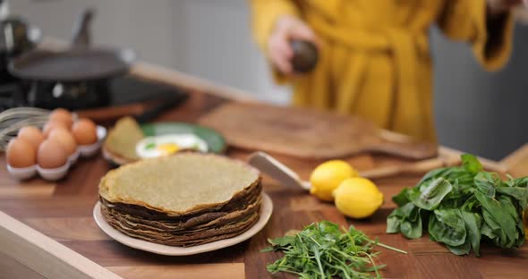 Preparing Healthy Breakfast on the Kitchen Table