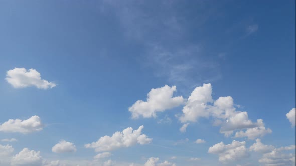 Time lapse of white cloud moving pass around sky background