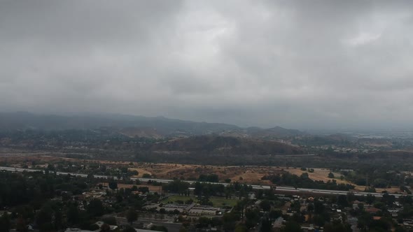 Aerial drone footage of the 210 freeway at Wheatland in Sylmar, California and the surrounding area