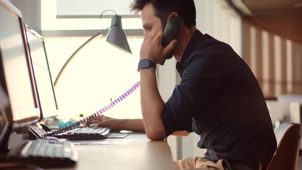 Man Working On Modern Office. Overworked Tired Businessman Working On Computer At Deadline.