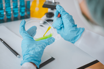 Female researchers are experimenting with pipette dropping