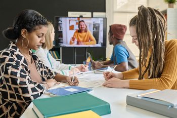 Multiethnic Group of Students in Video Call with Teacher