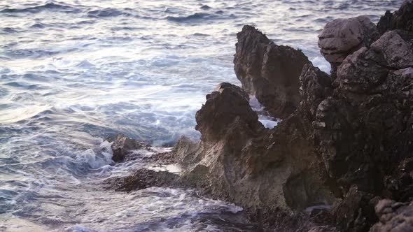 Sea Waves and Rocky Coast