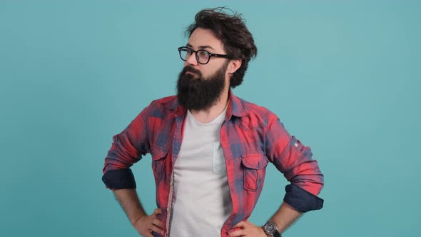 Shocked Young Bearded Man with Joyful Expression, Achievement.