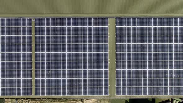 Aerial View of Solar Panels installed on a Commercial Roof