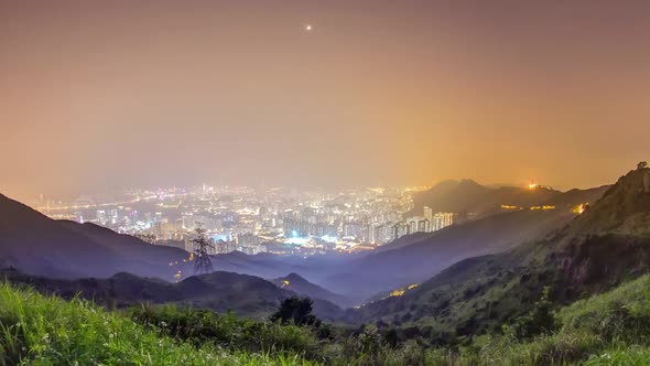 Cityscape of Hong Kong As Viewed Atop Kowloon Peak Night Timelapse with Hong Kong and Kowloon Below