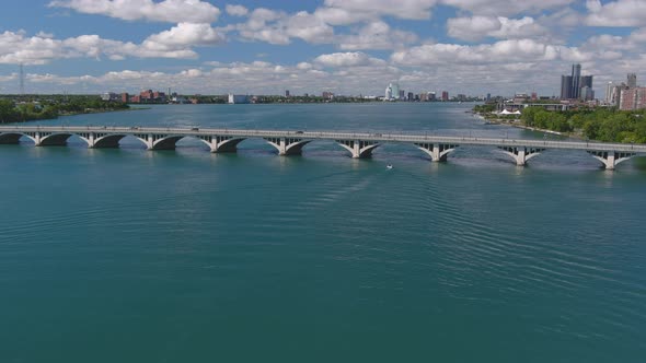 Establishing shot of the Douglas MacArthur Bridge over the Detroit river. This video was filmed in 4