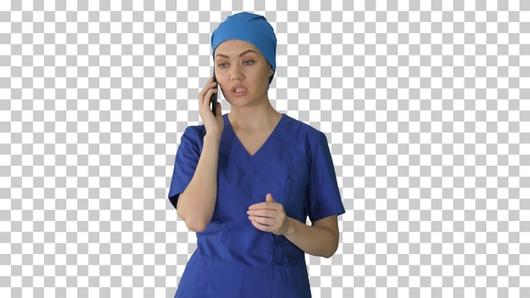 Serious female doctor talking on the phone, Alpha Channel