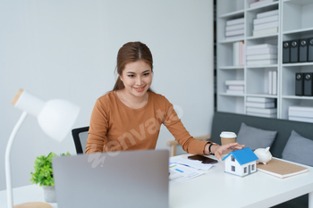 Smart Mortgage Planning woman using a calculator to make Calculations and Consideration