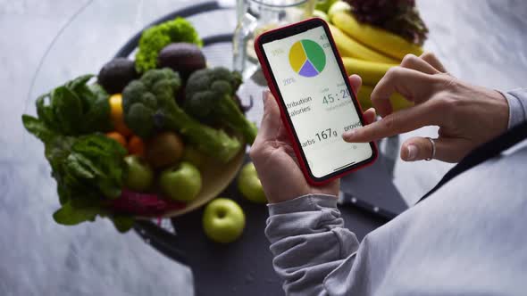 Lady Uses Smartphone to Check Calories