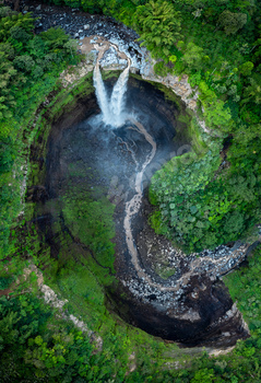 Aerial top view from above of Tumpak Sewu waterfall, East Java, Indonesia