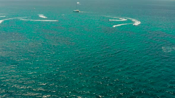 Tourists on a Jet Skis on a Tropical Resort