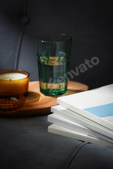 Amber Glass Candle Jar and Magazine on the couch