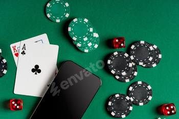 Playing Cards, Chips, and Cash on a Green Felt Surface With a Smartphone