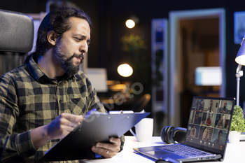 Freelancer with clipboard on video call