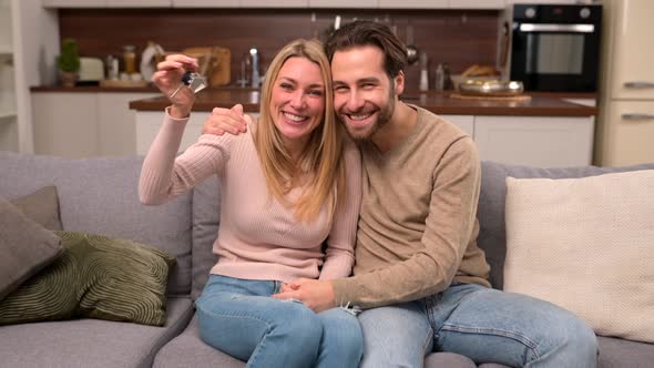 Excited Caucasian Couple in Love Move in a New Apartment