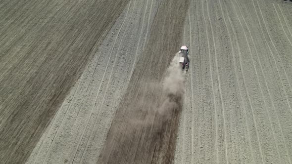 Tractor with a Sowing Unit Sowing Crops