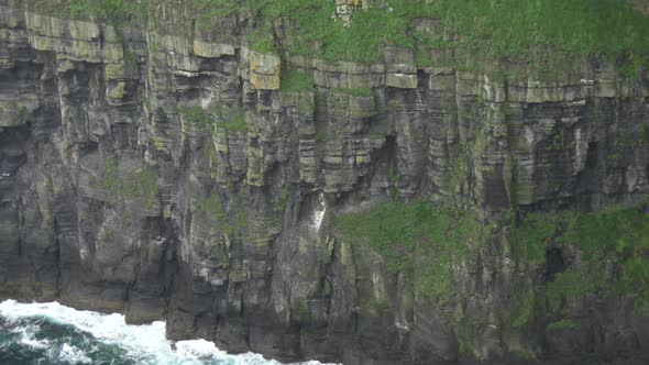 Tilt up view of Cliffs of Moher