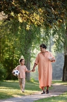 Family Walking in Park