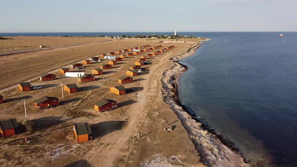 Bird'seye View of a Campsite Consisting of Wooden Houses on the Western Coast of Crimea Peninsula