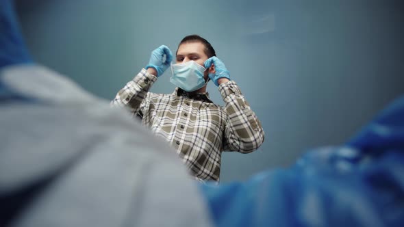 Throwing Away Single Use Medical Face Mask and Gloves