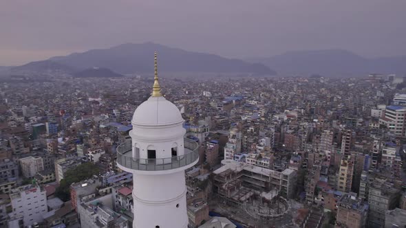 Flying near the top of the Dharahara Tower viewing Kathmandu