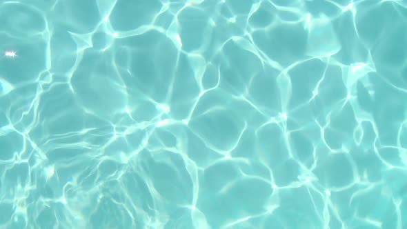 Ripples and reflections of light in swimming pool