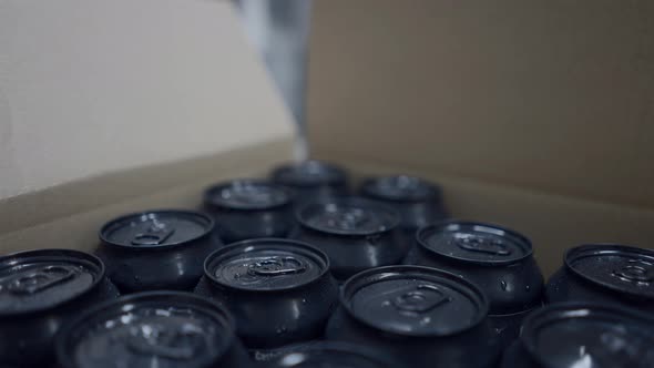 Fresh Batch Of Beers Canned And Boxed In A Beer Factory  Close Up Shot