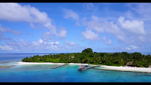 Aerial view texture of relaxing bay beach break by shallow water with white sandy background of adve