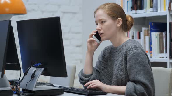 Redhead Woman Talking on Mobile Phone, Negotiation