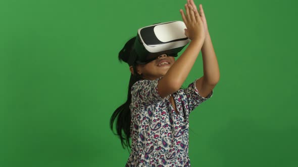 Asian Little Girl Dancing In Virtual Reality