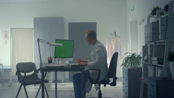 Physician Working Chroma Key Computer in Clinic