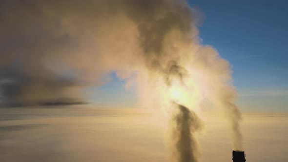 Aerial View of Coal Power Plant High Pipes with Black Smoke Moving Up Polluting Atmosphere at