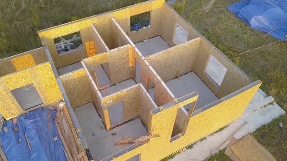 Construction of new and modern modular house. Walls made from composite wooden sip panels