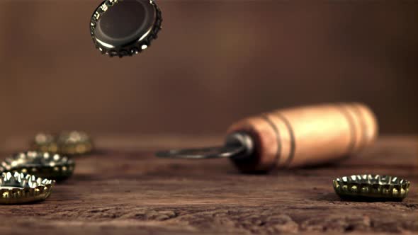 The Super Slow Motion Lid From the Beer Bottle Falls on the Table and Spins