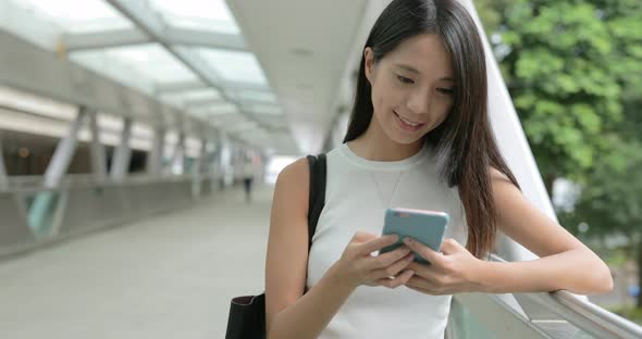 Woman Texting on Smartphone