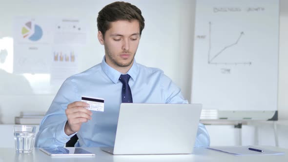 Online Shopping, Online Payment by Businessman at Work