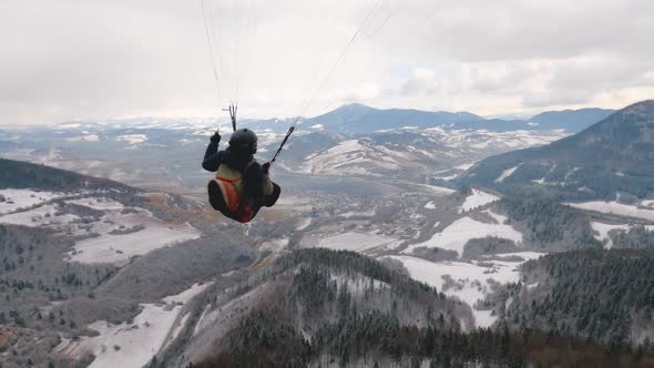 Paragliding Turn Above Winter Forest Mountain, Freedom Fly Adrenaline Adventure